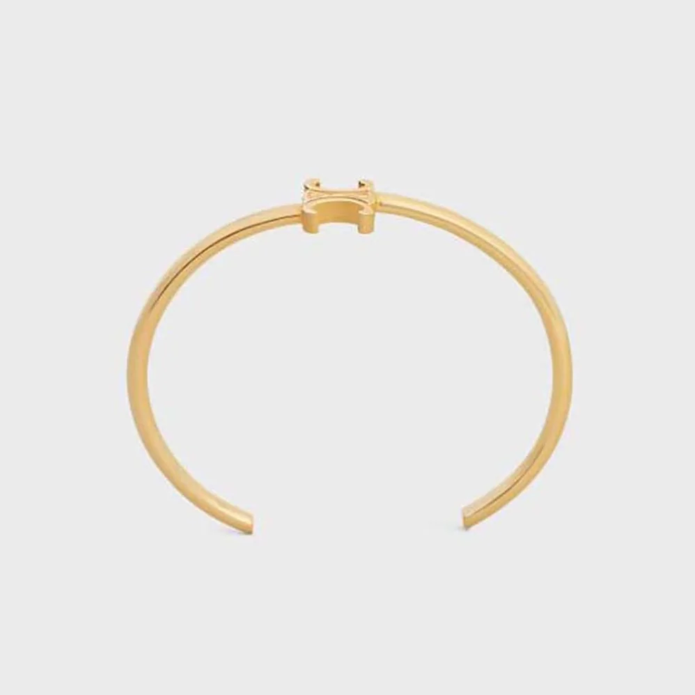 Celine Triomphe Asymmetric Cuff in Brass with Gold Finish for Women Celine Triomphe Asymmetric Cuff in Brass with Gold Finish for Women