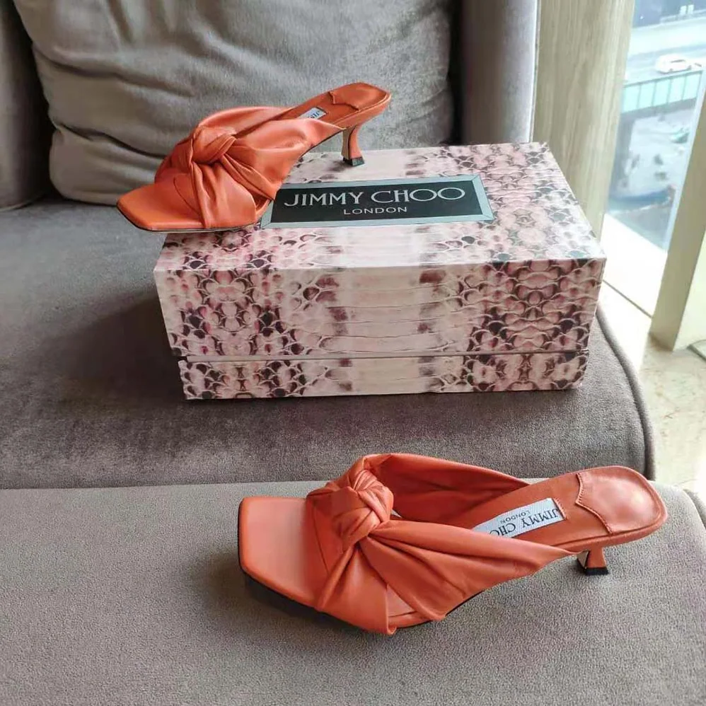 Jimmy Choo Avenue 50 Latte Nappa Leather Mules for Women in Orange Jimmy Choo Avenue 50 Latte Nappa Leather Mules for Women in Orange