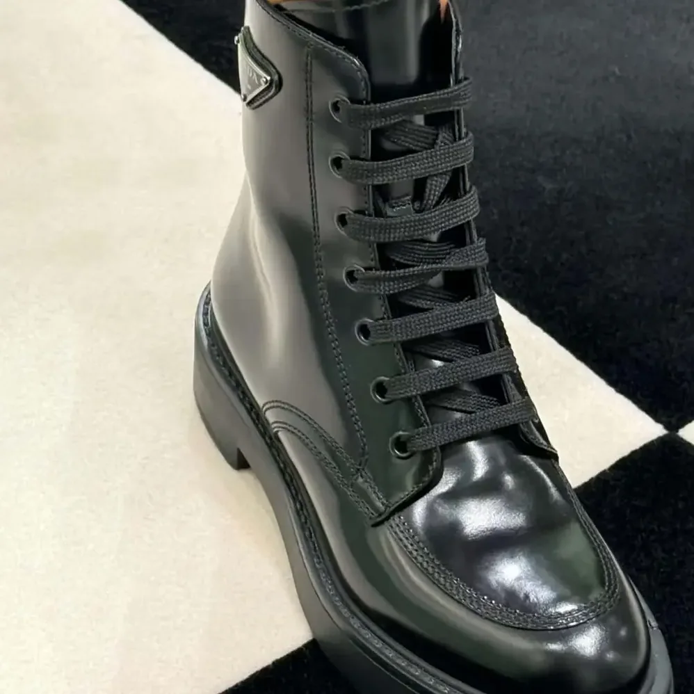 Prada Brushed Leather Combat Boots for Unisex in Black
