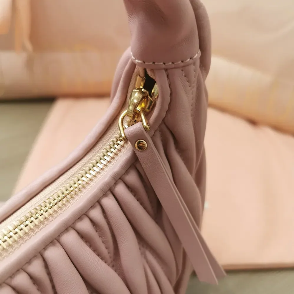 Miu Miu Wander Matelassé Nappa Leather Hobo Bag for Women in Alabaster Pink Miu Miu Wander Matelassé Nappa Leather Hobo Bag for Women in Alabaster Pink