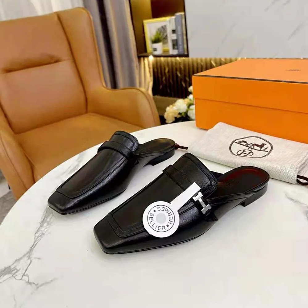 Hermes Groupie Mule in Goatskin with Miniature Palladium-Plated Paris Buckle for Women in Black