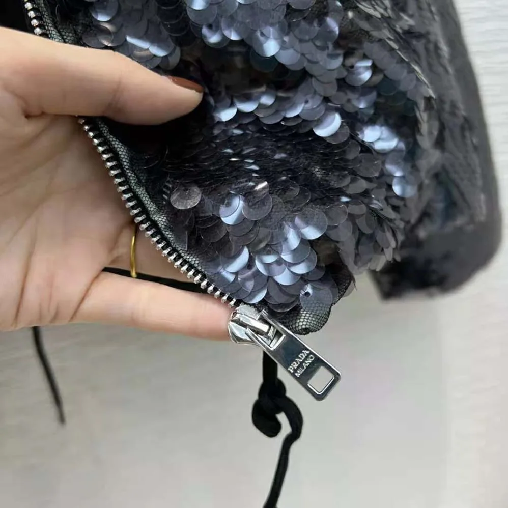 Prada Convertible Sequined Re-Nylon Down Jacket for Women in Black Prada Convertible Sequined Re-Nylon Down Jacket for Women in Black