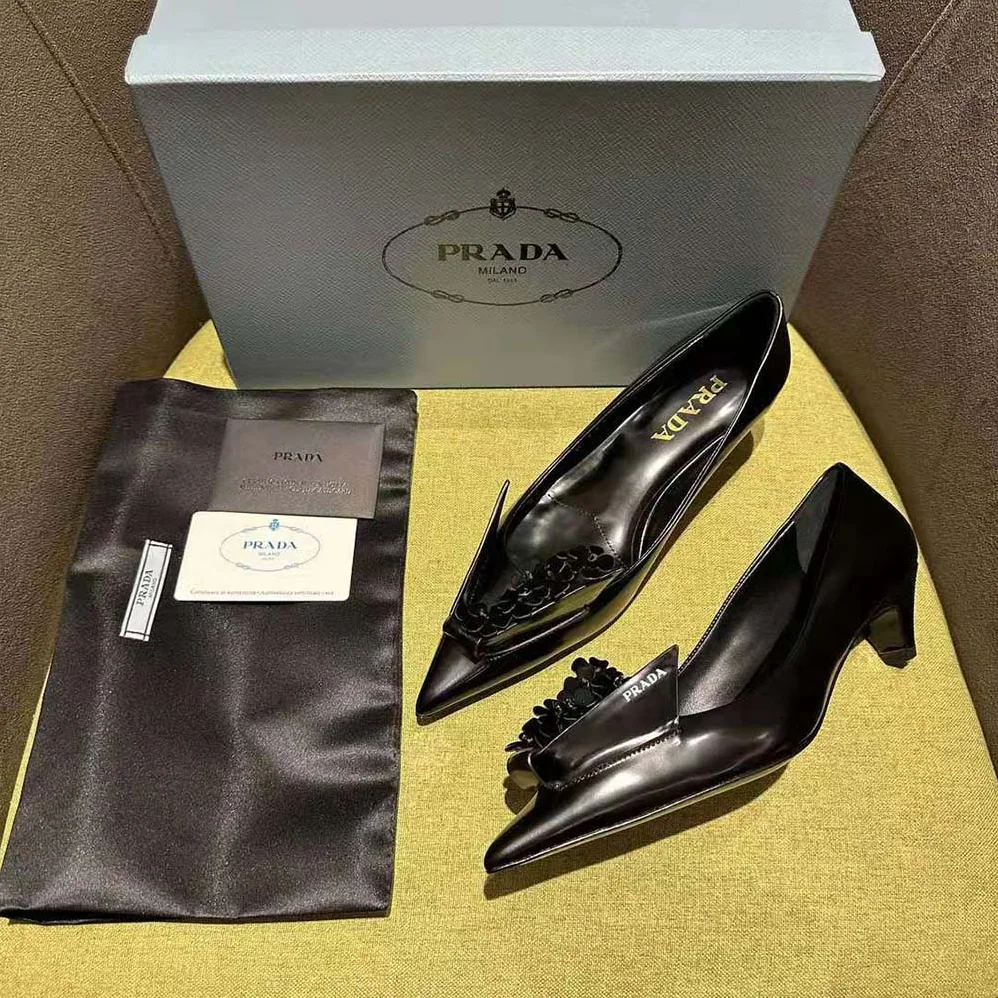 Prada Brushed Leather Pumps with Floral Appliqués for Women in Black