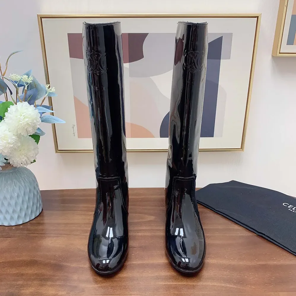 Celine Les Bottes Celine Triomphe High Boot in Patent Calfskin for Women in Black