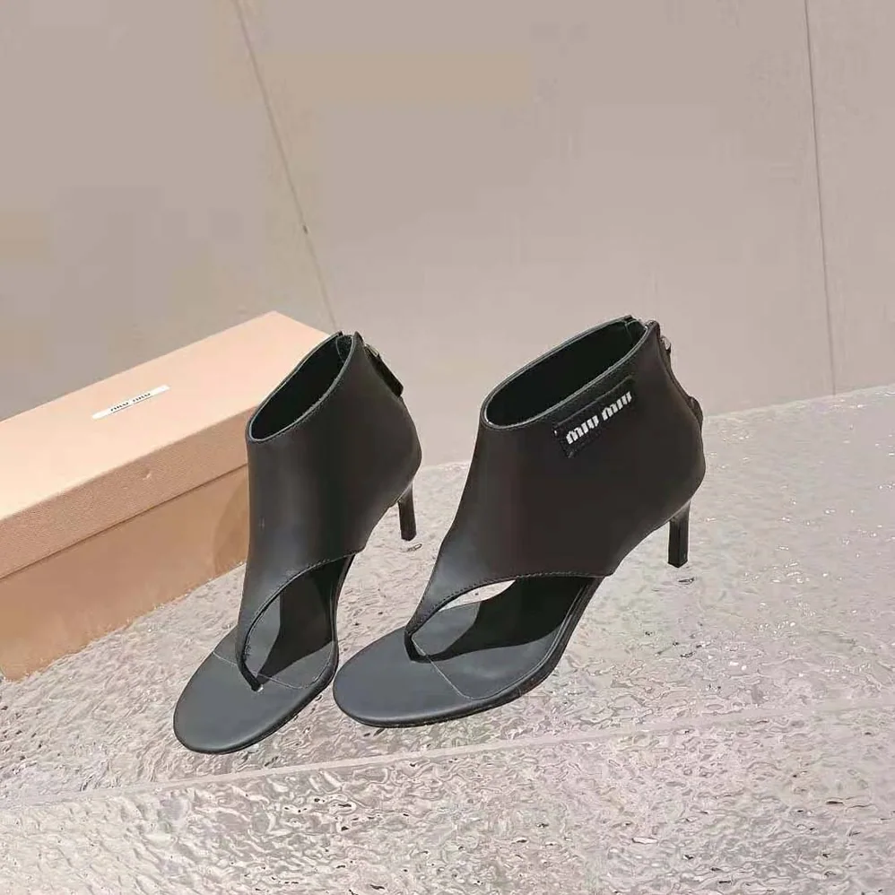 Miu Miu Leather Thong Booties for Women in Black