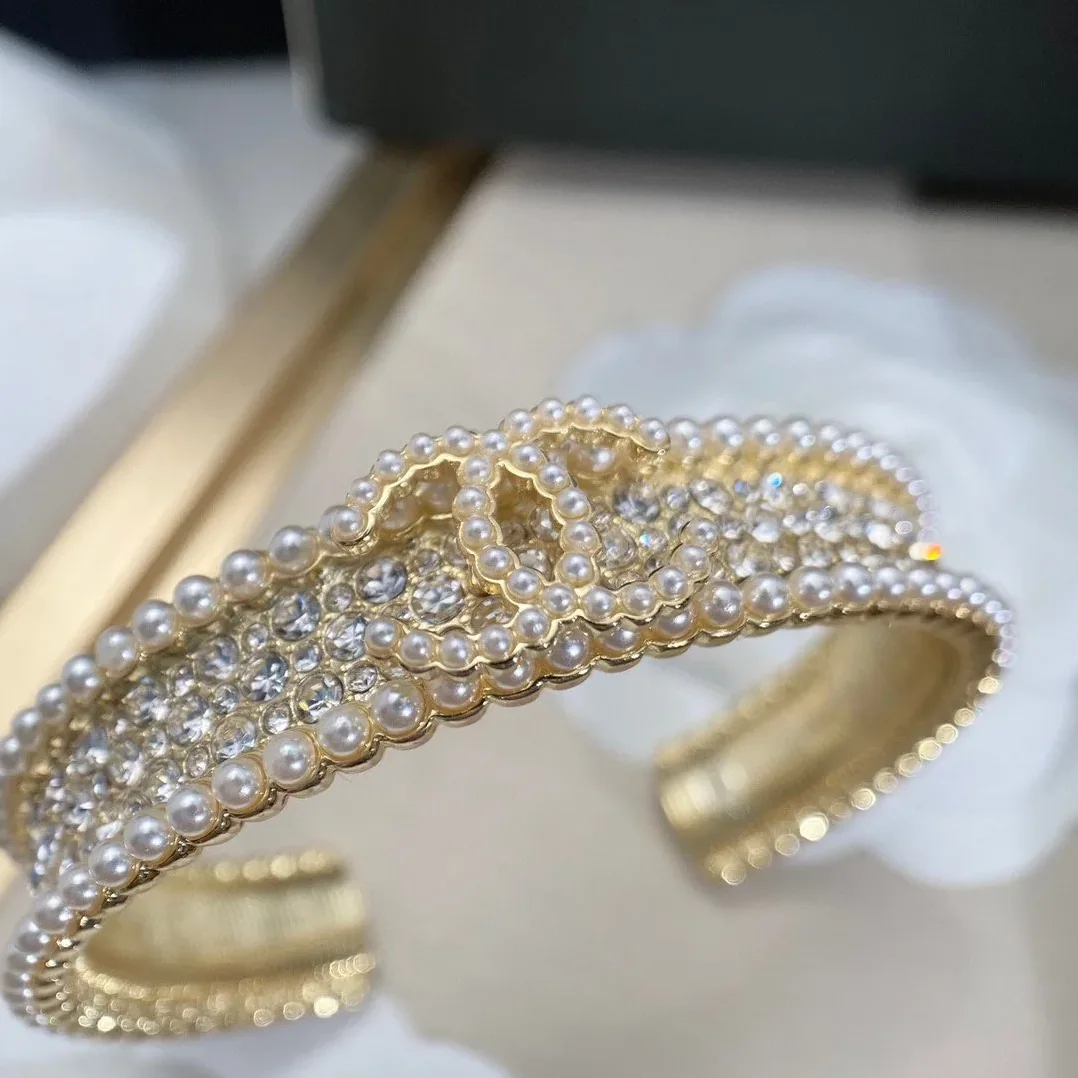Chanel Pearl And Crystal Interlocking CC Cuff Bracelet Gold Hardware Chanel Pearl And Crystal Interlocking CC Cuff Bracelet Gold Hardware