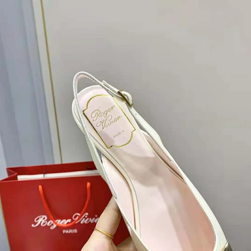 Roger Vivier Trompette Metal Buckle Slingback Ballerinas in Patent Leather for Women in White Roger Vivier Trompette Metal Buckle Slingback Ballerinas in Patent Leather for Women in White