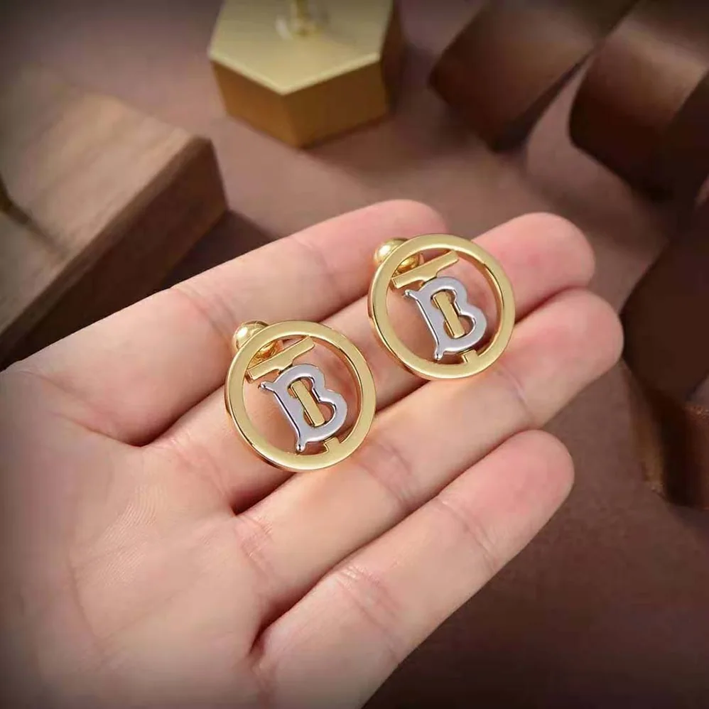 Burberry Gold and Palladium for Women in plated Monogram Motif Earrings Burberry Gold and Palladium for Women in plated Monogram Motif Earrings