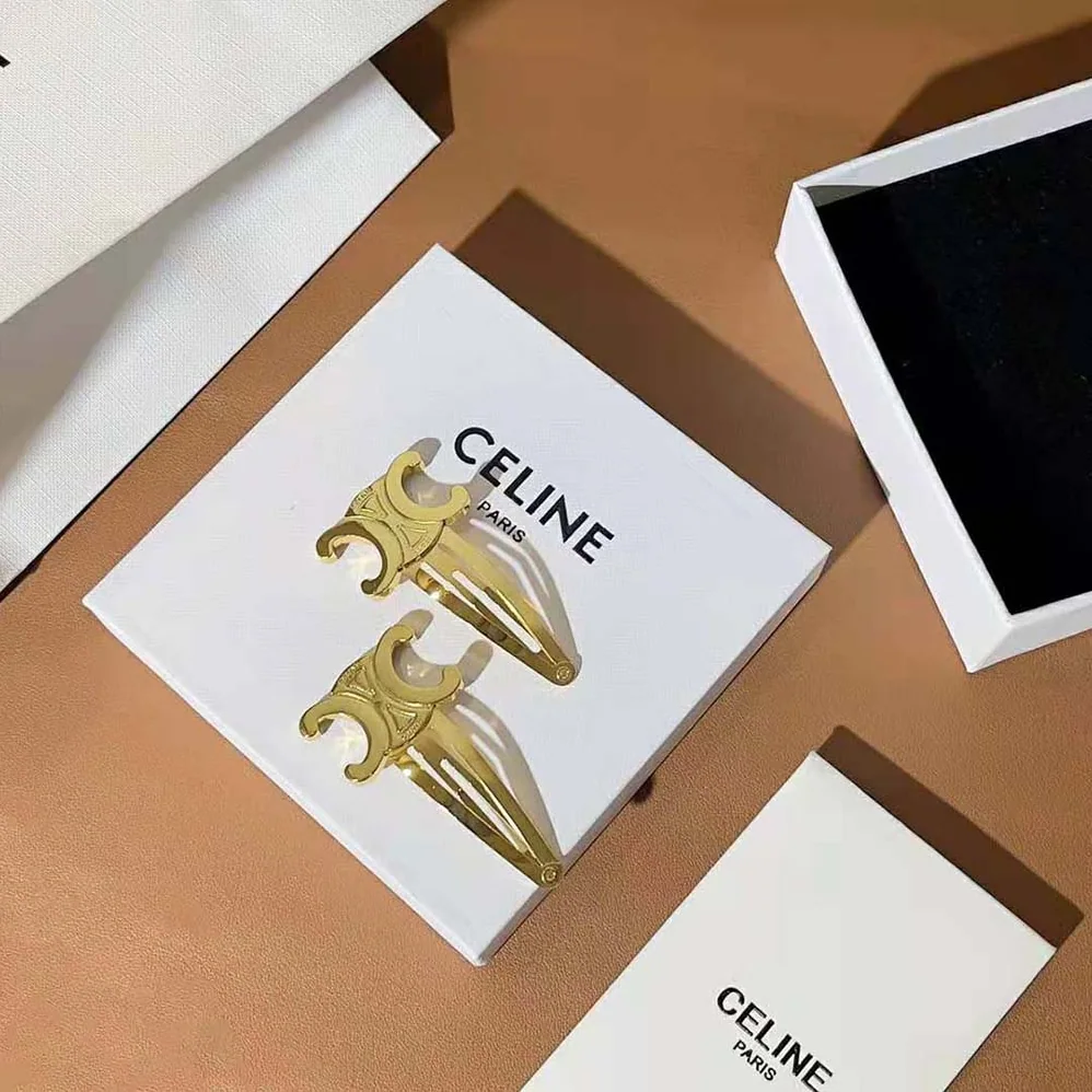 Celine Hair Accessories Set of 2 Triomphe Snap Hair Clips in Brass with Gold Finish and Steel for Women Celine Hair Accessories Set of 2 Triomphe Snap Hair Clips in Brass with Gold Finish and Steel for Women