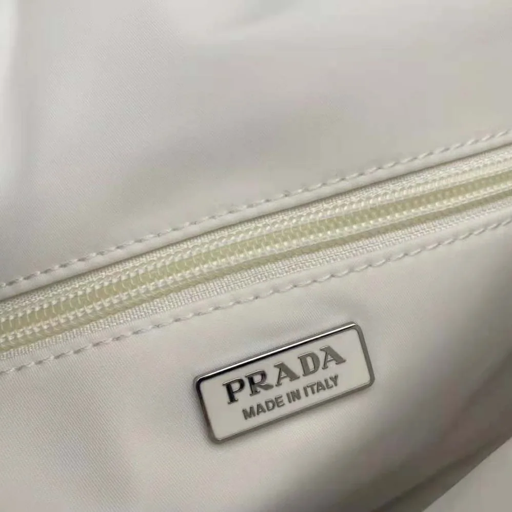 Prada Small Padded Re-Nylon Shoulder Bag for Women in White Prada Small Padded Re-Nylon Shoulder Bag for Women in White
