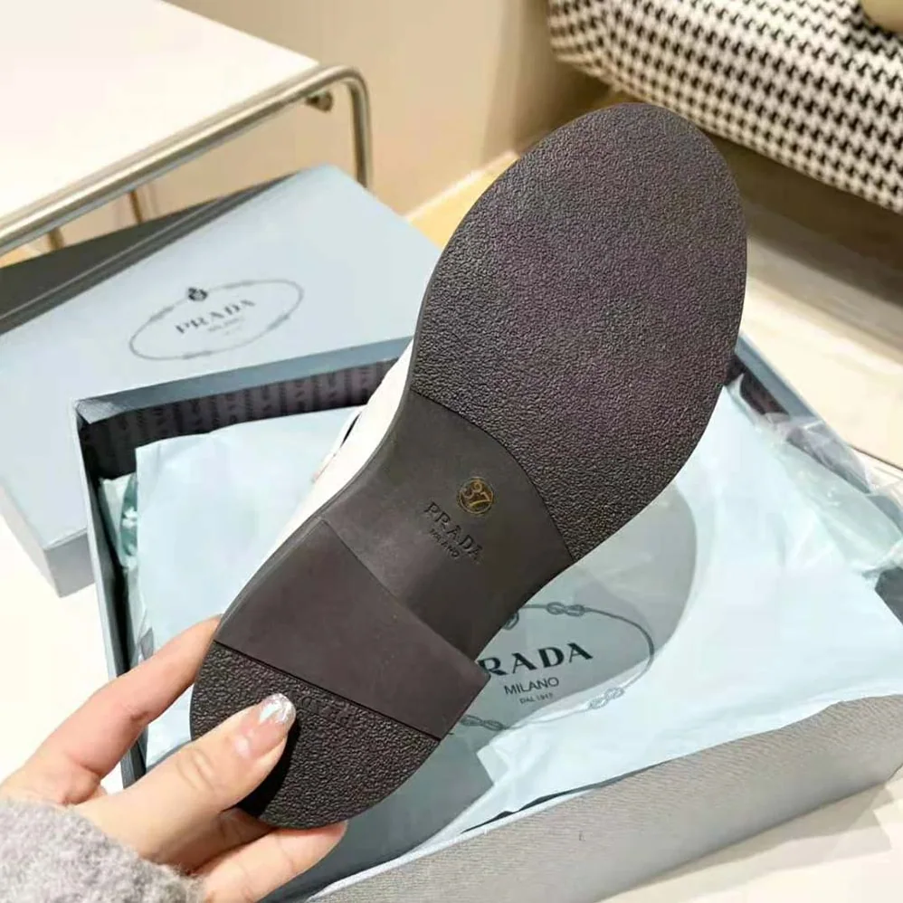 Prada Brushed-Leather Mary Jane T-Strap Shoes for Women in White Prada Brushed-Leather Mary Jane T-Strap Shoes for Women in White