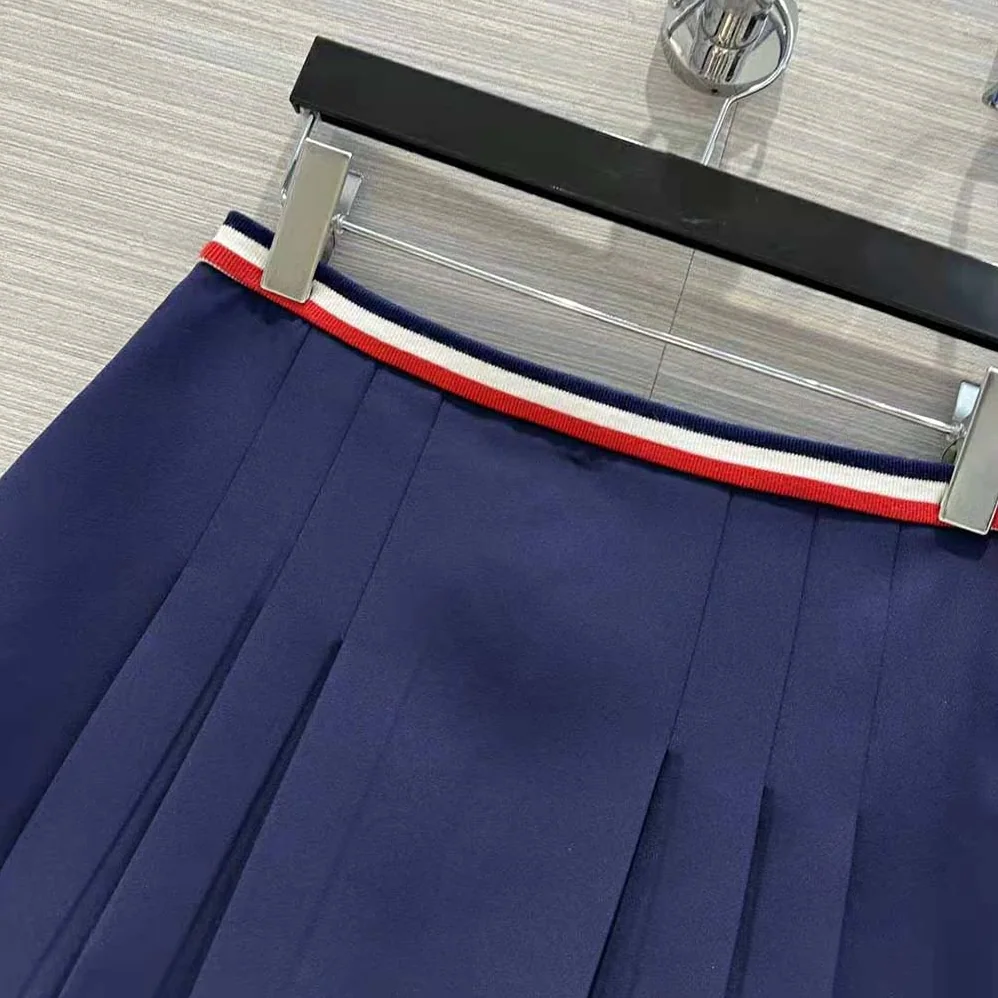 Celine Pleated Mini Skirt in Cotton Gabardine for Women in Navy Celine Pleated Mini Skirt in Cotton Gabardine for Women in Navy