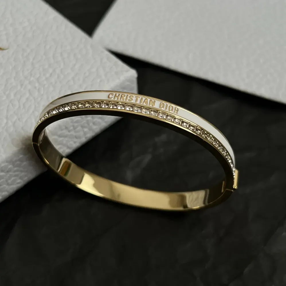 Dior Night Code Bangle Gold-Finish Metal White Crystals and White Lacquer for Women Dior Night Code Bangle Gold-Finish Metal White Crystals and White Lacquer for Women
