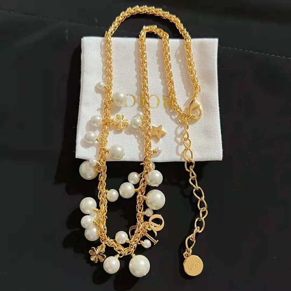 Dior Dio(r)evolution Necklace Gold-Finish Metal and White Resin Pearls for Women Dior Dio(r)evolution Necklace Gold-Finish Metal and White Resin Pearls for Women
