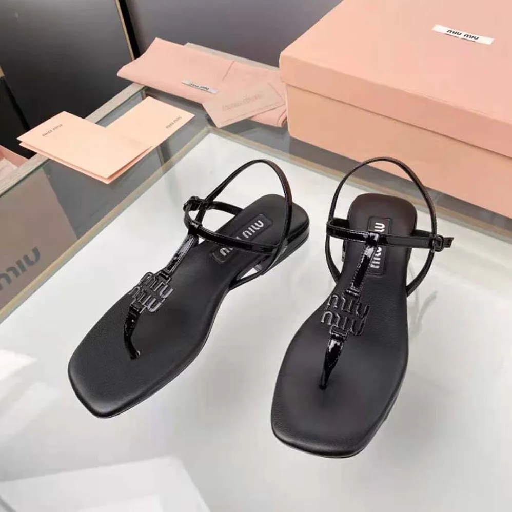 Miu Miu Patent Thong Sandals with Metal Lettering Logo for Women in Black Miu Miu Patent Thong Sandals with Metal Lettering Logo for Women in Black
