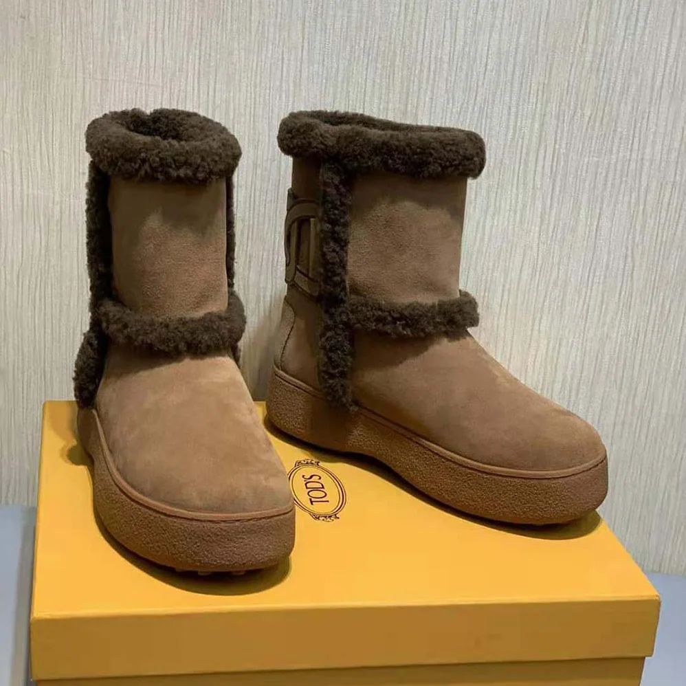 TODS Tod's W. G. Ankle Boots in Suede for Unisex in Brown