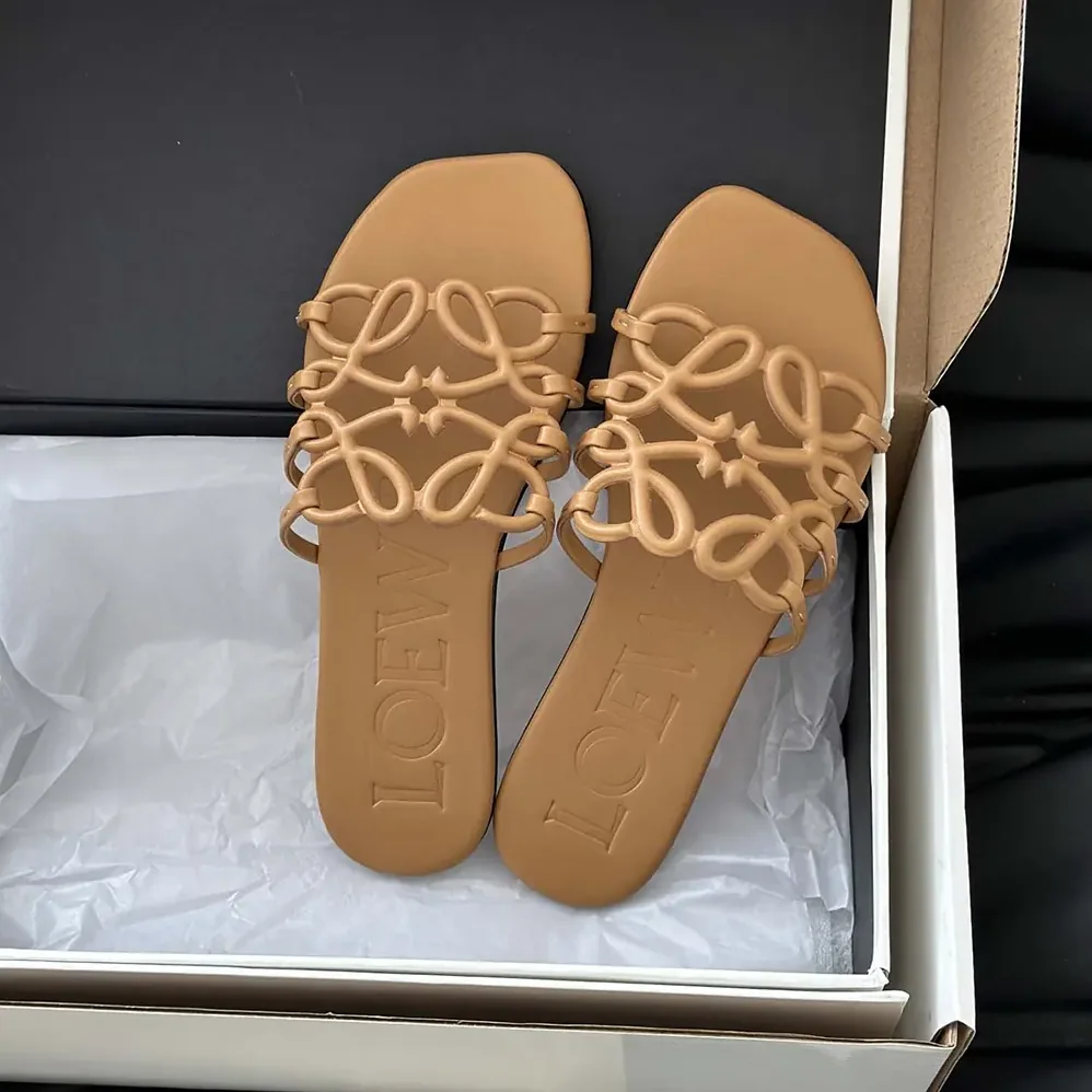 Loewe Petal Anagram Slide in Soft Calfskin for Women in Brown Loewe Petal Anagram Slide in Soft Calfskin for Women in Brown