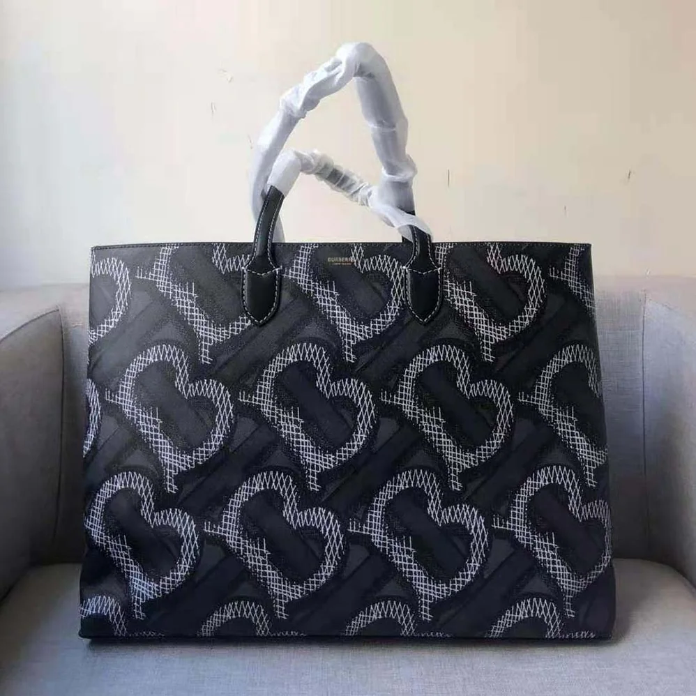 Burberry Monogram Print E-canvas Tote Bag for Women in Black Burberry Monogram Print E-canvas Tote Bag for Women in Black