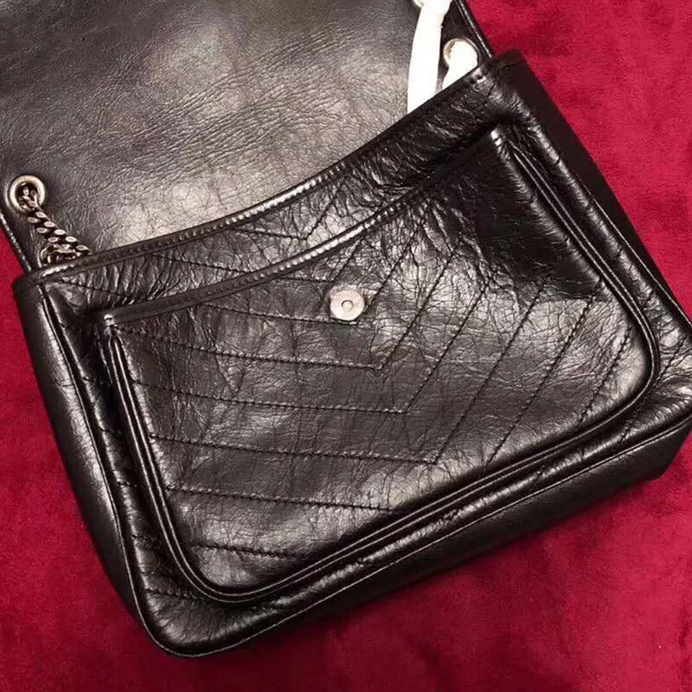 Saint Laurent YSL Niki Large in Vintage Leather for Women in Black