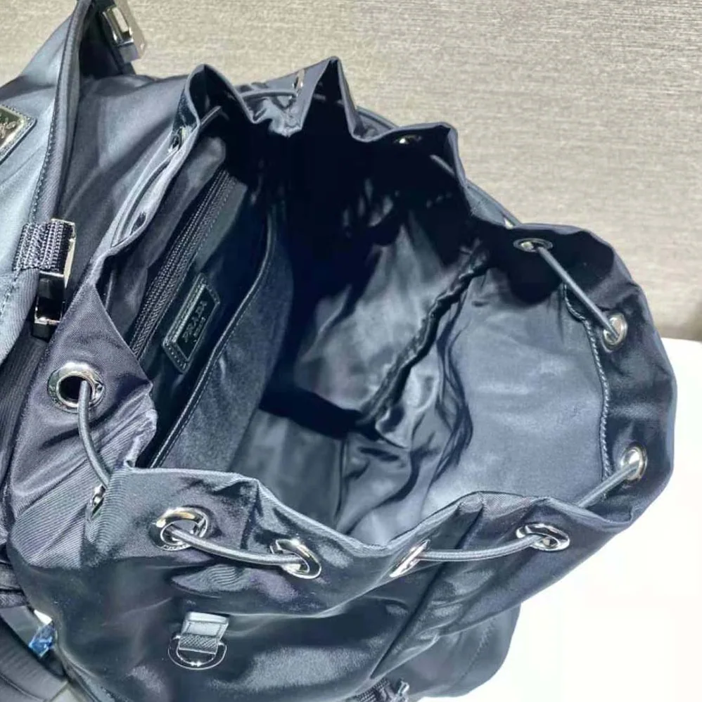 Prada Re-Nylon and Saffiano Leather Backpack with Hood for Men Prada Re-Nylon and Saffiano Leather Backpack with Hood for Men