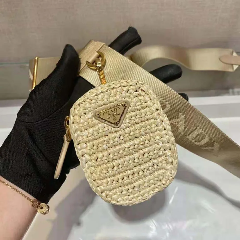 Prada Re-Edition 2005 Raffia Bag for Women in Natural Prada Re-Edition 2005 Raffia Bag for Women in Natural