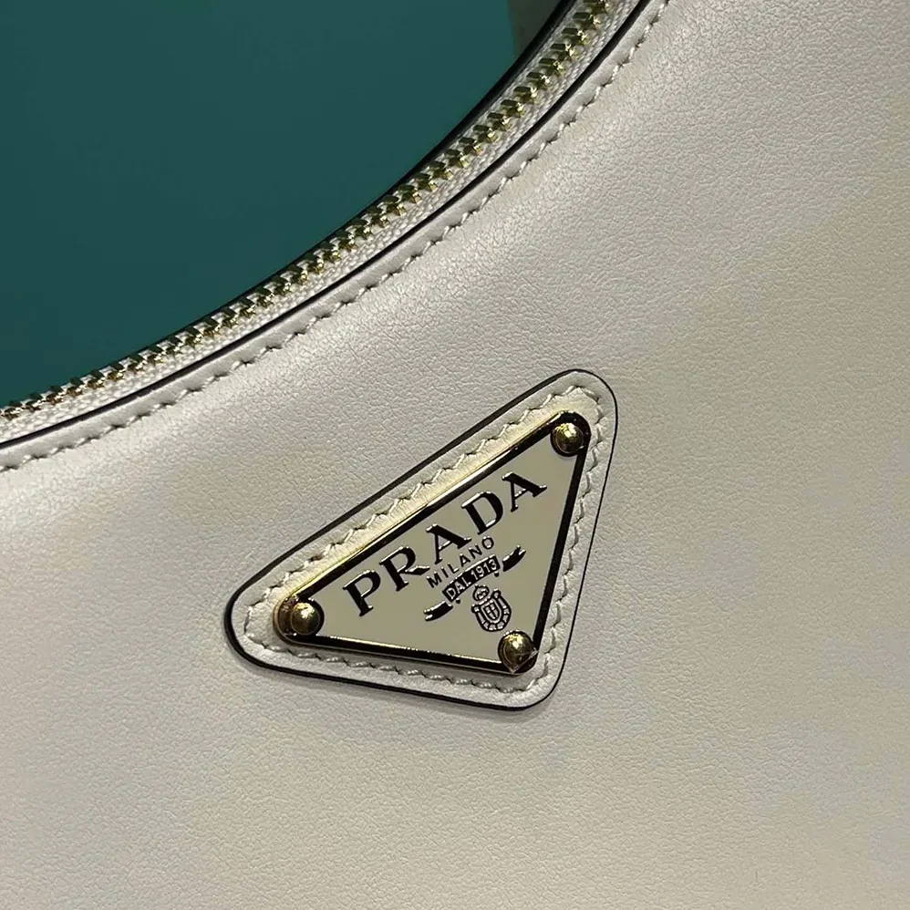 Prada Arqué Mini Leather Shoulder Bag for Women in White Prada Arqué Mini Leather Shoulder Bag for Women in White