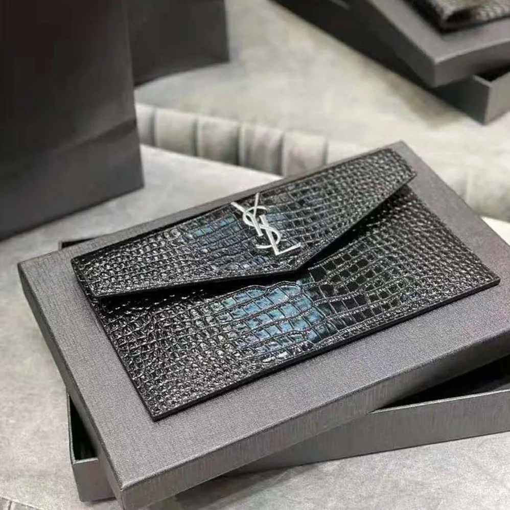 Saint Laurent YSL Uptown Pouch in Crocodile Embossed Shiny Leather for Women in Silver