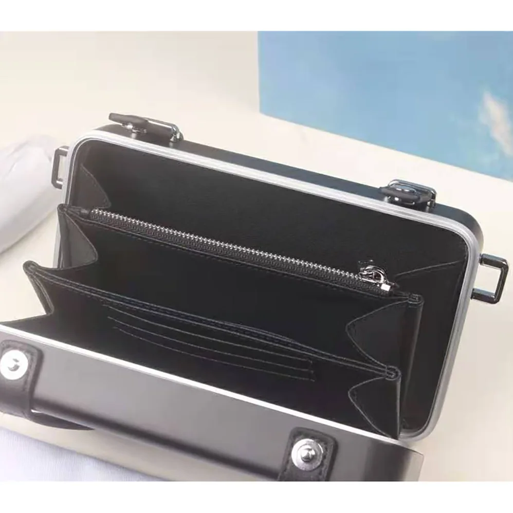 Dior Dior and Rimowa Personal Clutch Aluminum and Grained Calfskin for Men in Black Dior Dior and Rimowa Personal Clutch Aluminum and Grained Calfskin for Men in Black