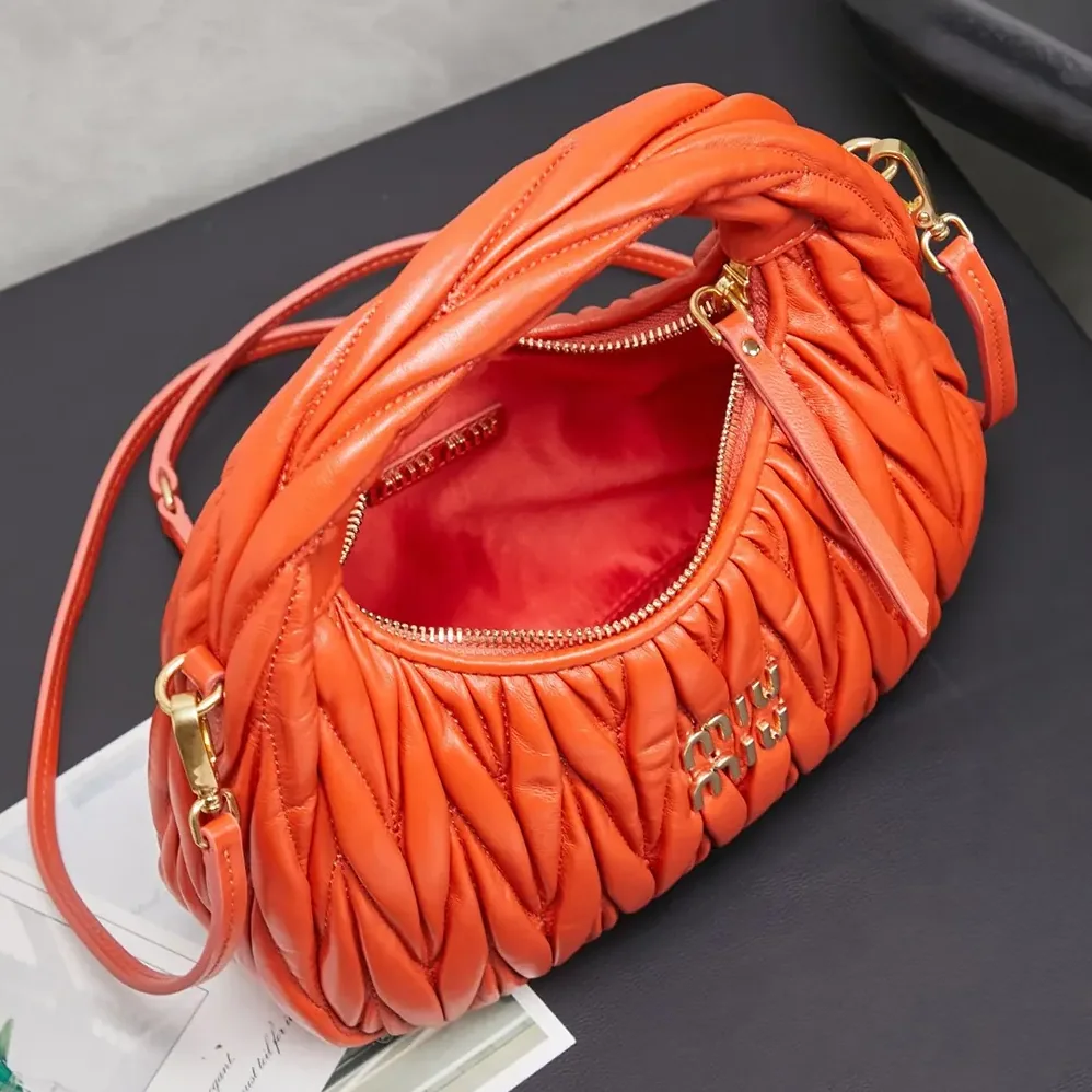 Miu Miu Wander Matelassé Nappa Leather Hobo Bag for Women in Orange Miu Miu Wander Matelassé Nappa Leather Hobo Bag for Women in Orange