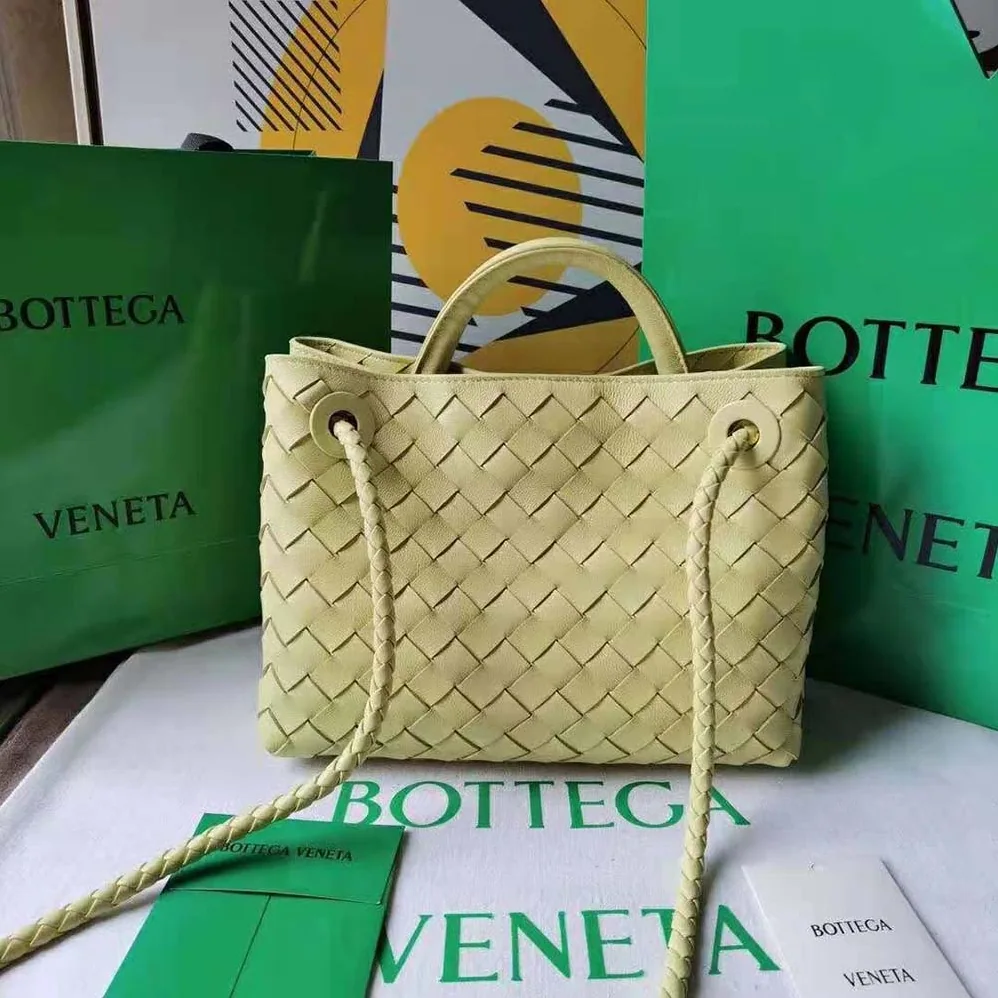Bottega Veneta Small Andiamo Intrecciato Leather Top Handle Bag for Women in Yellow