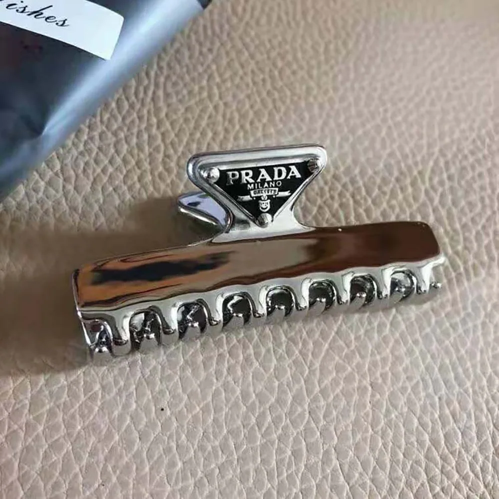 Prada Metal Hair Clip with Sophisticated and Versatile Allure for Women Prada Metal Hair Clip with Sophisticated and Versatile Allure for Women