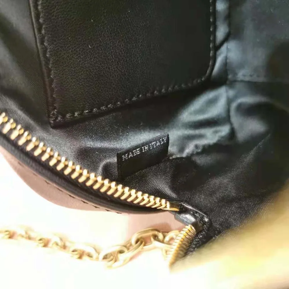 Miu Miu Matelassé Nappa Leather Top-Handle Mini-Bag for Women in Black Miu Miu Matelassé Nappa Leather Top-Handle Mini-Bag for Women in Black