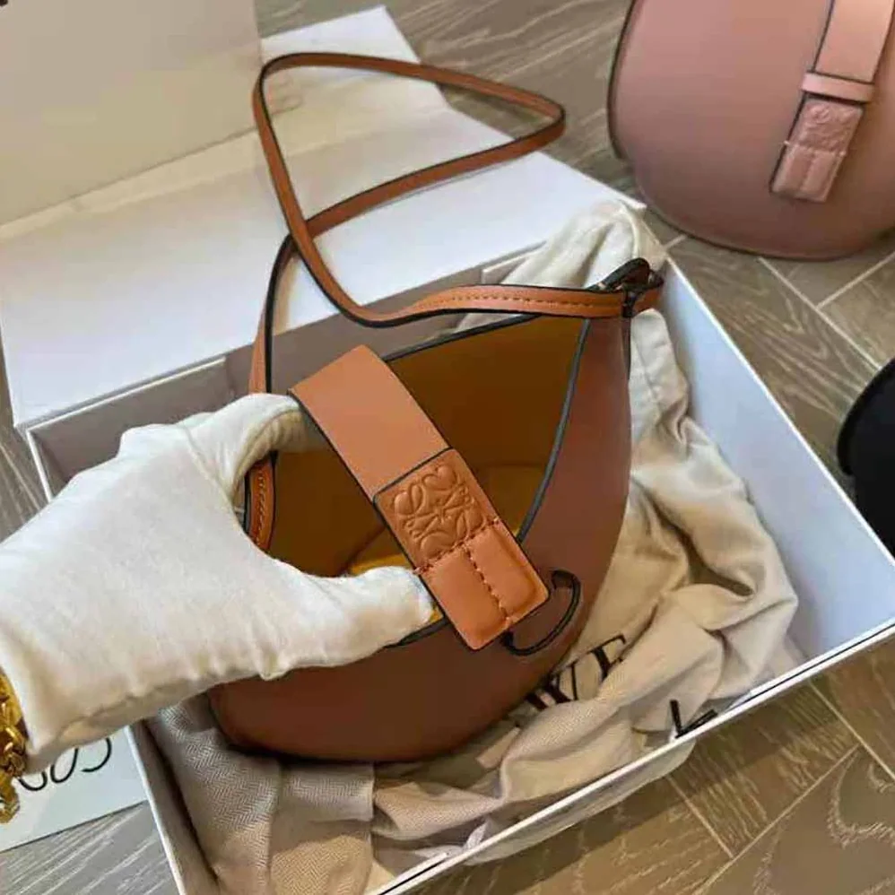 Loewe Moulded Bucket Bag in Calfskin for Women in Brown