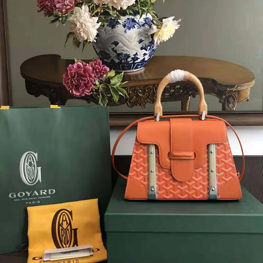 Goyard Sac Saïgon PM in Toile Goyardine & Clamecy Calfskin for Women in Orange Goyard Sac Saïgon PM in Toile Goyardine & Clamecy Calfskin for Women in Orange