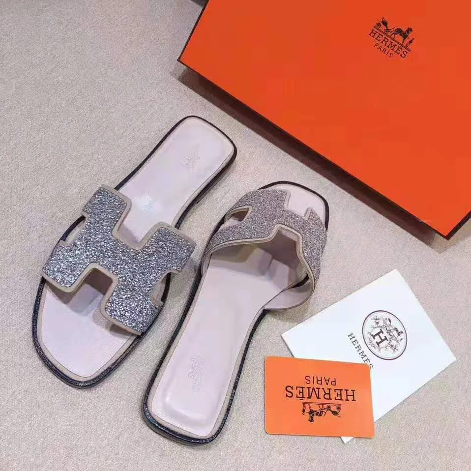 Hermes Oran Sandal Hermes Sandal in Metallic Nappa Leather and Cristal Powder for Women in Sandy