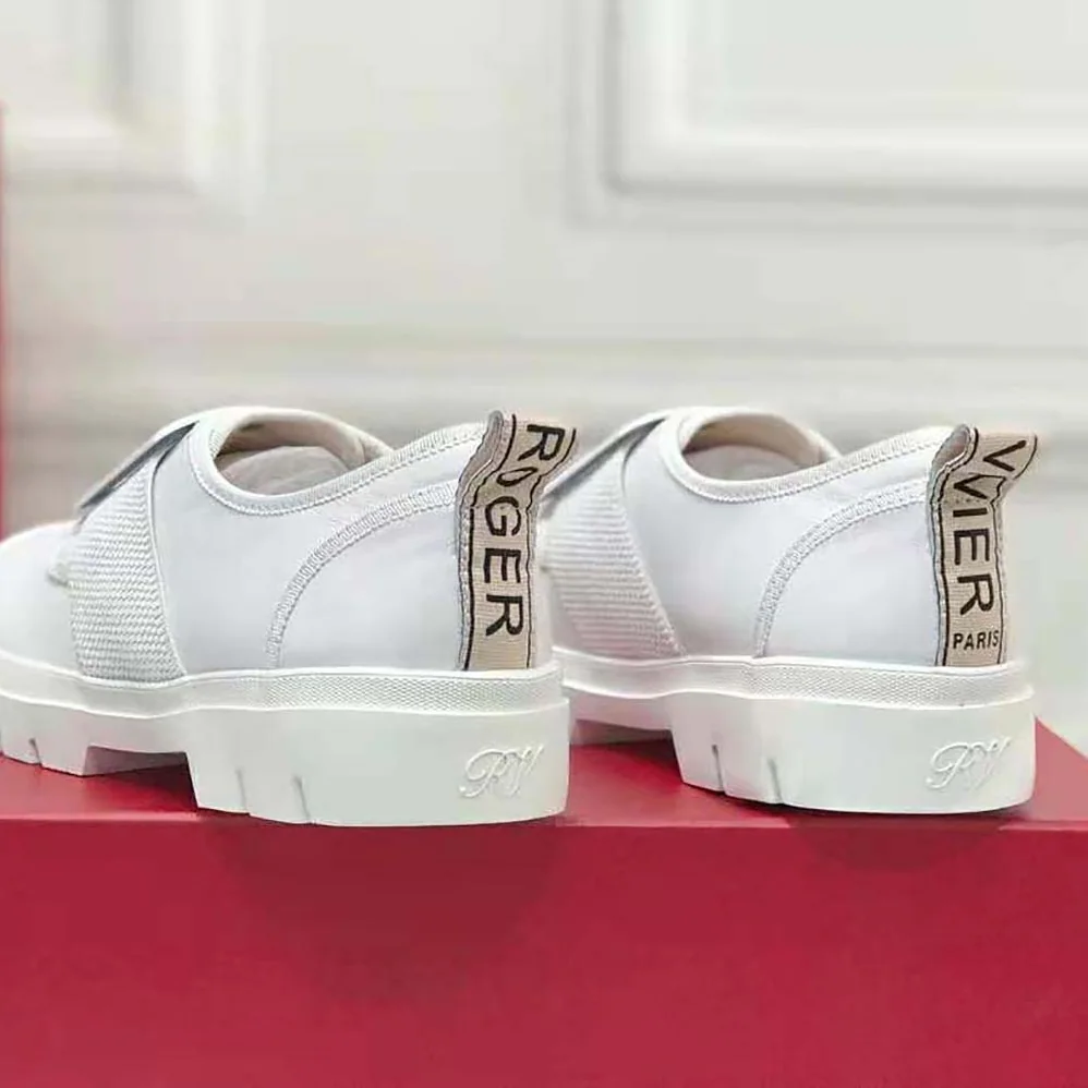 Roger Vivier Walky Viv' Lacquered Buckle Sneakers in Patent Leather for Women in White Roger Vivier Walky Viv' Lacquered Buckle Sneakers in Patent Leather for Women in White