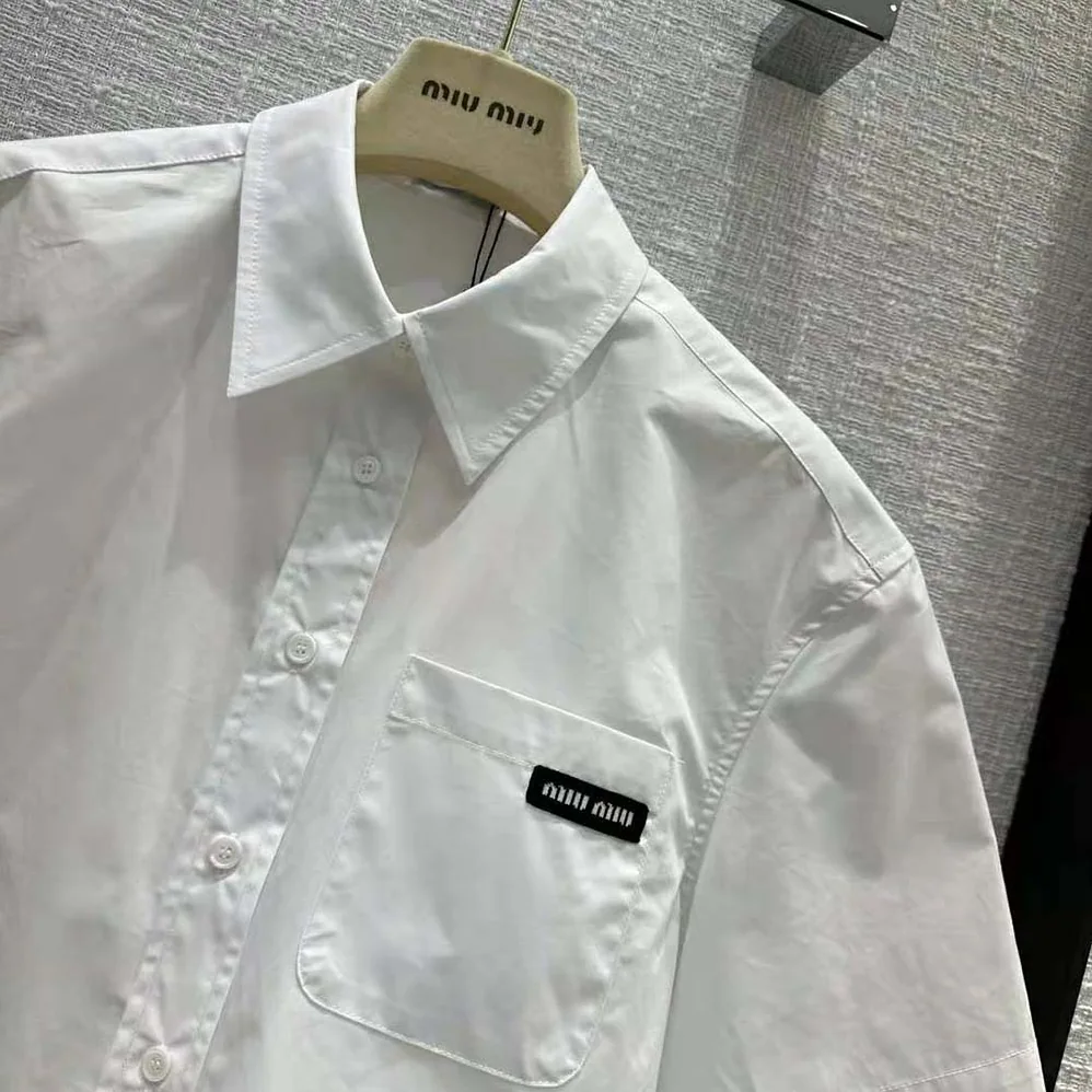 Miu Miu Poplin Shirt with Sartorial Logo Label for Women in White Miu Miu Poplin Shirt with Sartorial Logo Label for Women in White