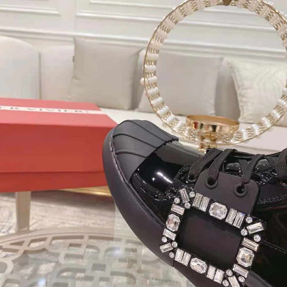 Roger Vivier Viv Skate Lace Up Strass Buckle Booties in Leather for Women in Black Roger Vivier Viv Skate Lace Up Strass Buckle Booties in Leather for Women in Black