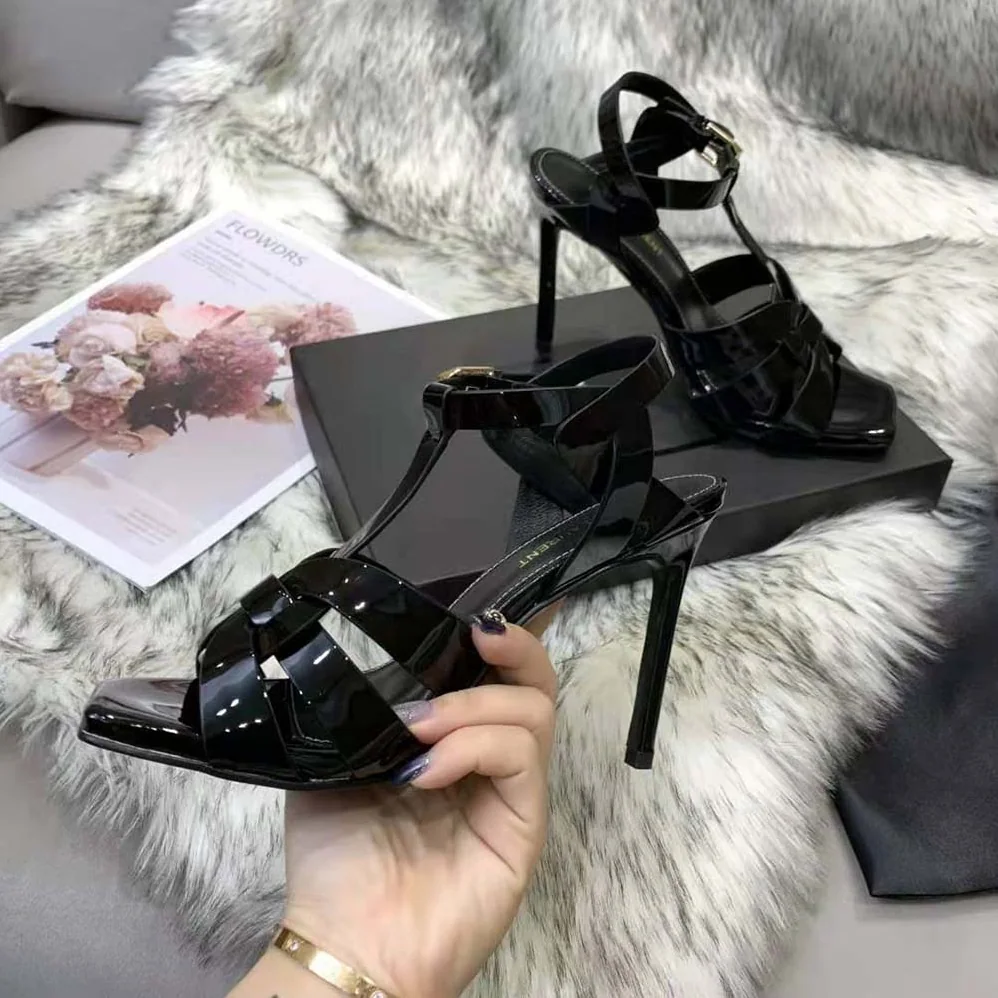 Saint Laurent YSL Tribute Sandals in Patent Leather in 105mm Heel Hight for Women in Black