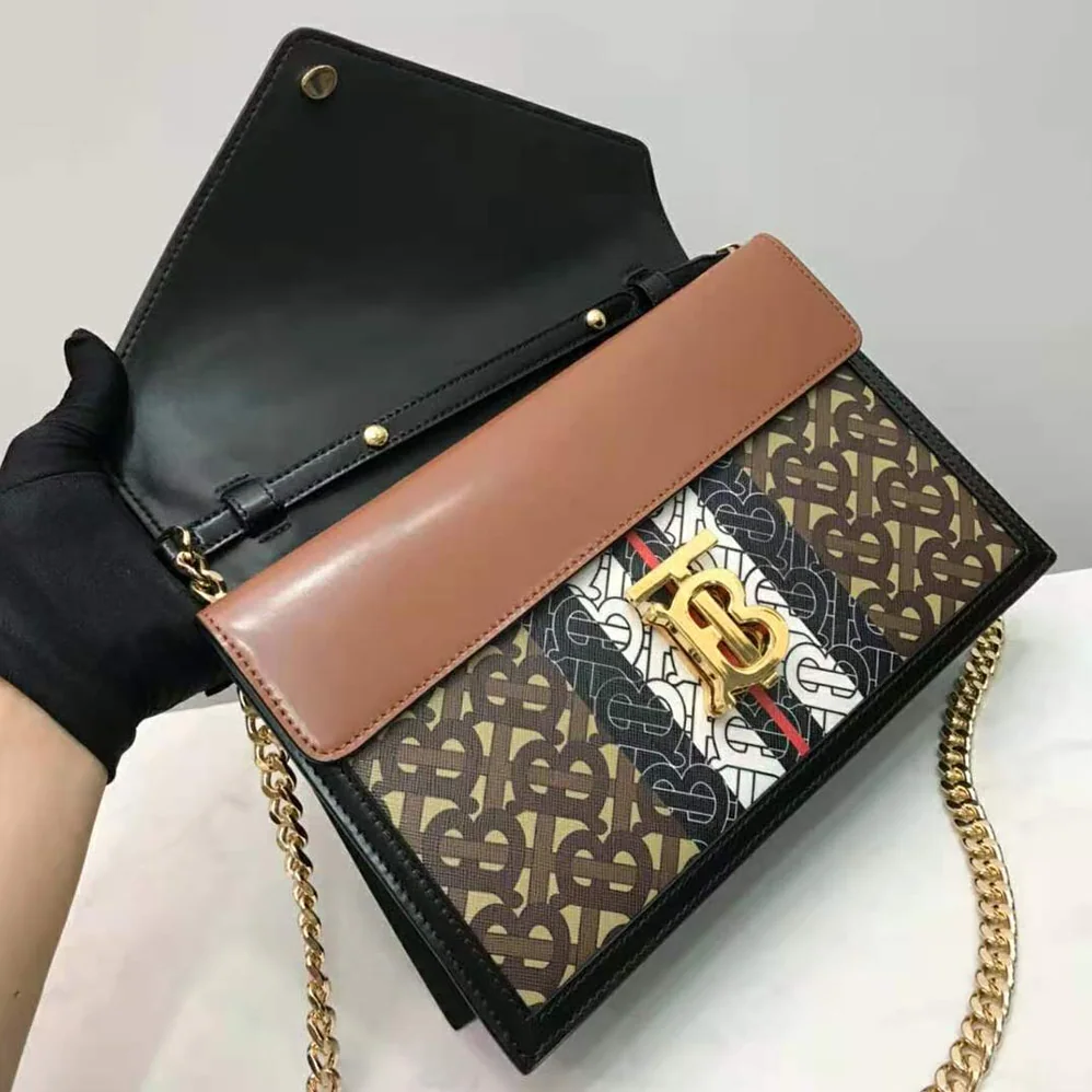 Burberry Small Monogram Stripe E for Women in canvas TB Envelope Clutch Burberry Small Monogram Stripe E for Women in canvas TB Envelope Clutch