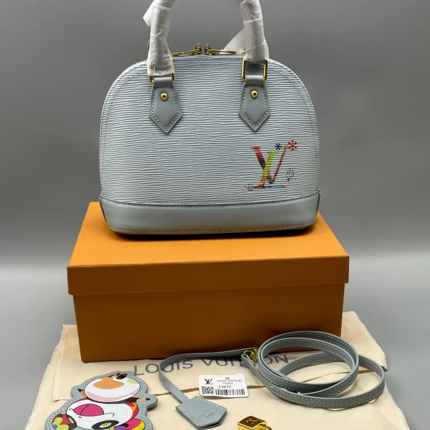 Louis Vuitton LV x TM Alma BB Top Handle Bag in Washed Blue Gold Hardware
