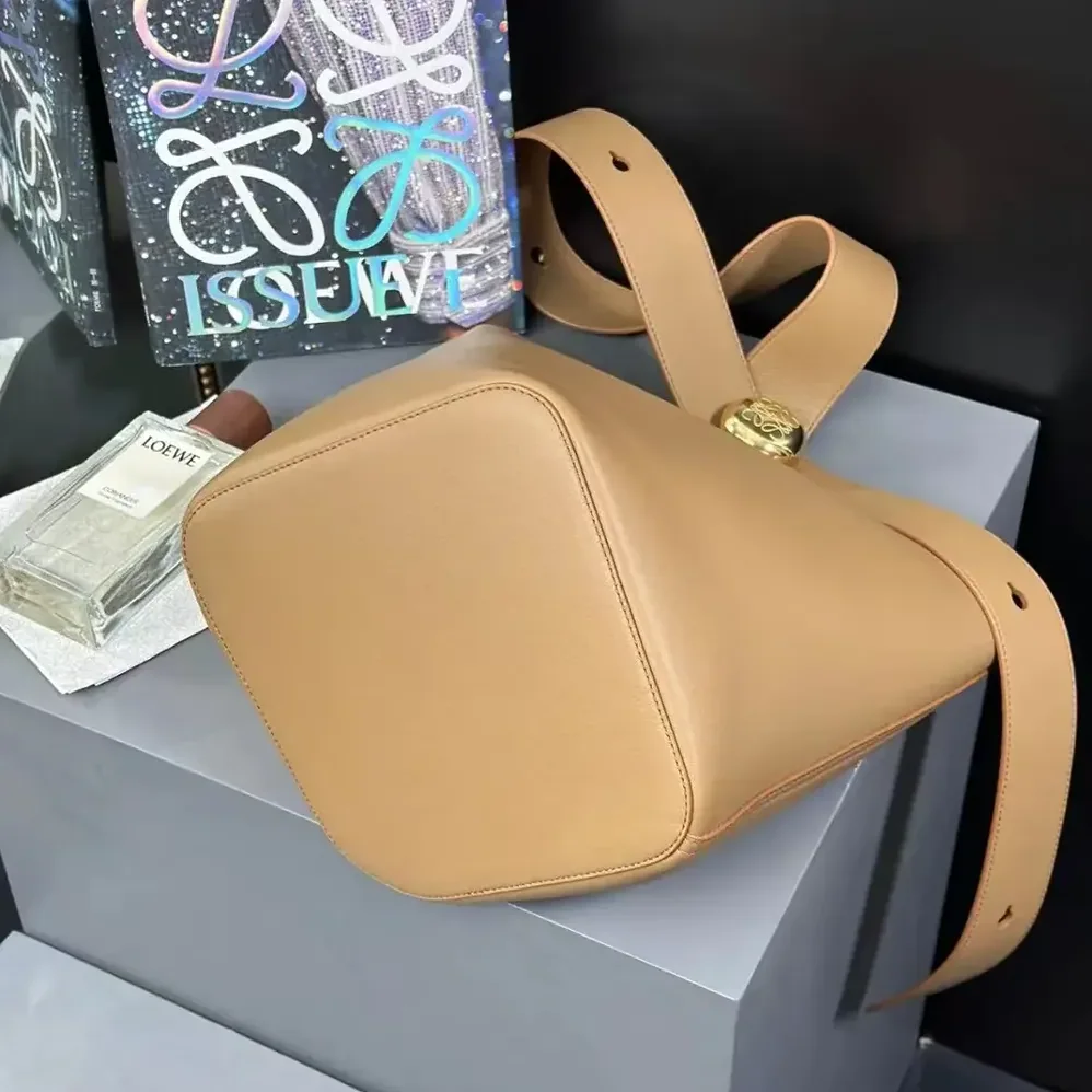 Loewe Medium Pebble Bucket Bag in Mellow Calfskin for Unisex in Brown