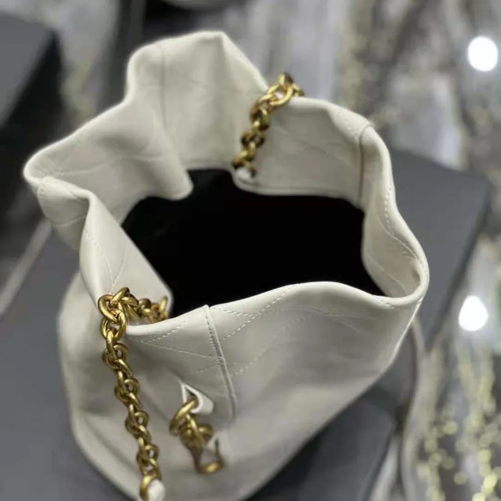 Saint Laurent YSL Le Maillon Hook Bucket Bag in Supple Leather for Women in White Saint Laurent YSL Le Maillon Hook Bucket Bag in Supple Leather for Women in White