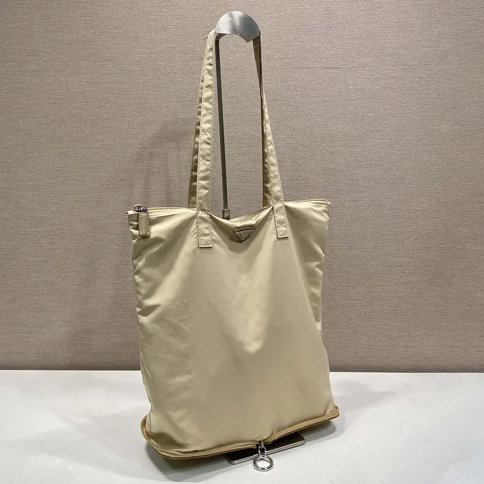 Prada Saffiano Leather Pendant With Re-Nylon Tote Bag for Women in Camel Brown Prada Saffiano Leather Pendant With Re-Nylon Tote Bag for Women in Camel Brown