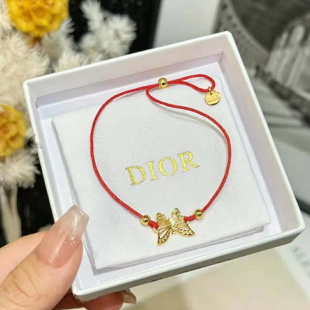 Dior Diorelita Bracelet Gold-Finish Metal and Red Cotton for Women Dior Diorelita Bracelet Gold-Finish Metal and Red Cotton for Women