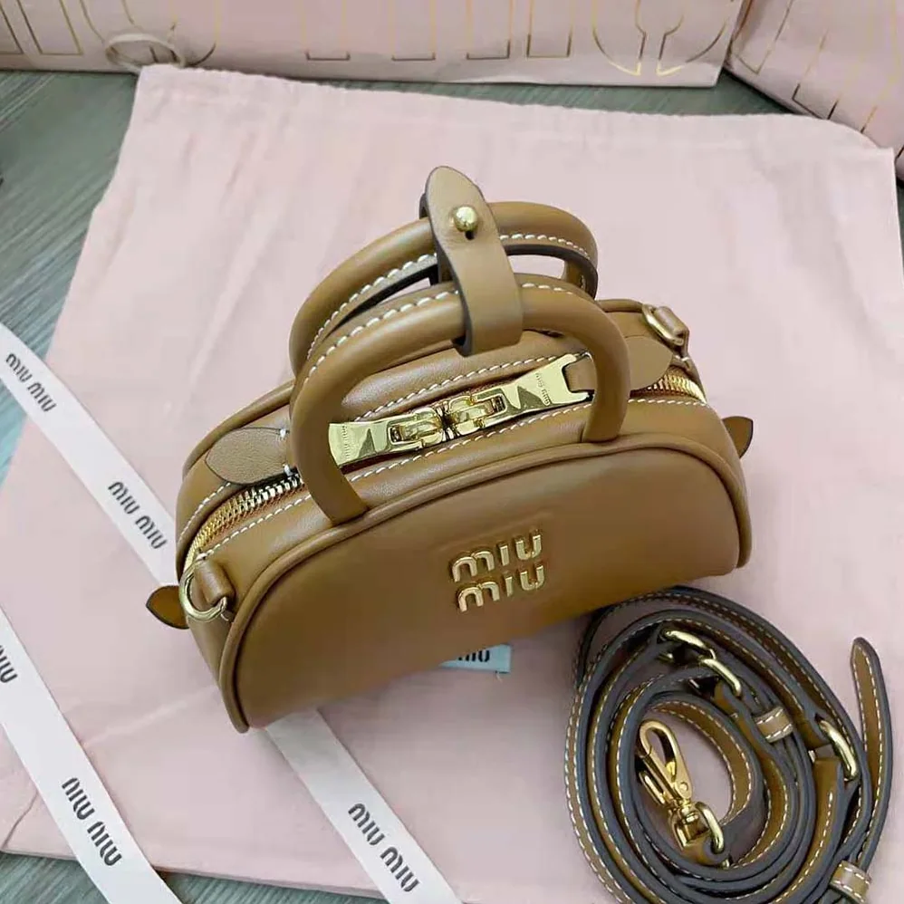 Miu Miu Mini Leather Top-handle Bag for Women in Brown