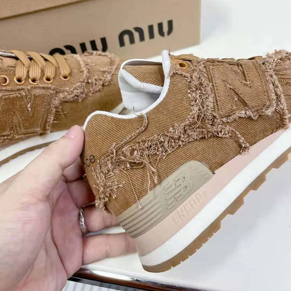 Miu Miu New Balance 574 x Miu Miu Marbleized Denim Sneakers for Women in Brown