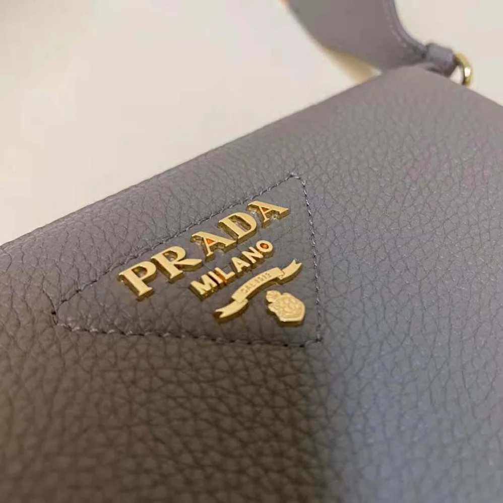 Prada Leather Shoulder Bag with Metal Lettering Logo for Women in Gray Prada Leather Shoulder Bag with Metal Lettering Logo for Women in Gray