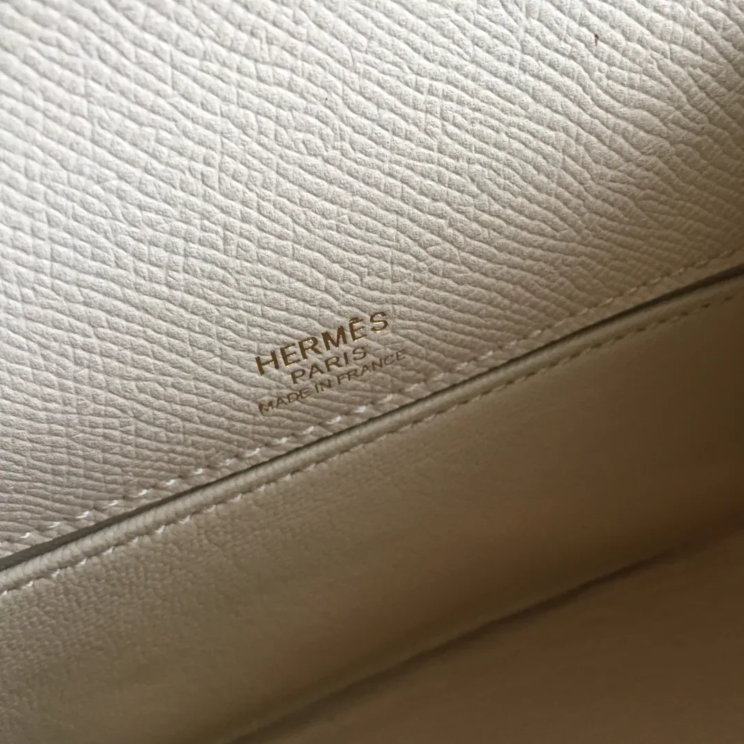 Hermes Kelly Pochettee White Gold Toned Hardware /
