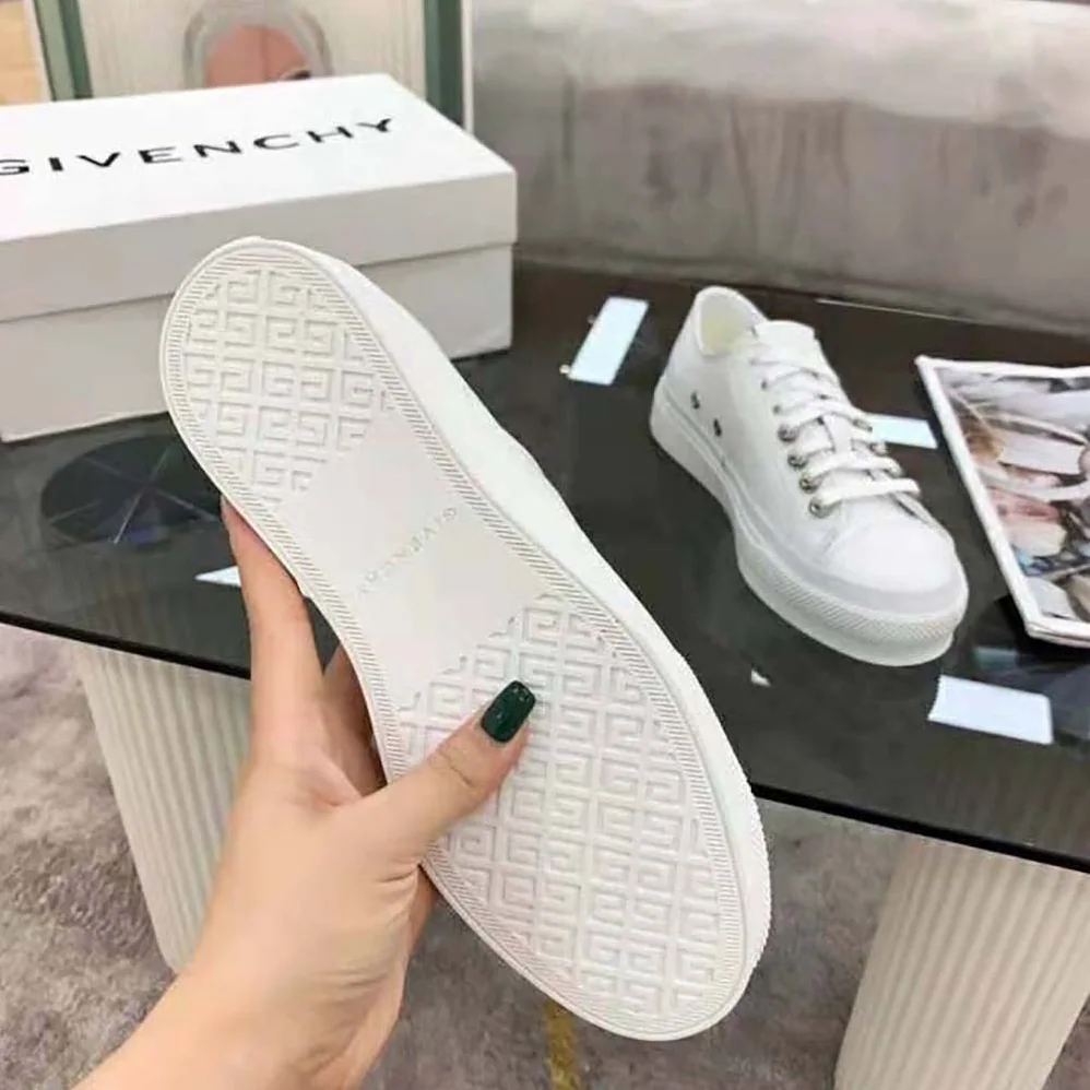 Givenchy Sneakers City in Canvas and Leather for Women in White Givenchy Sneakers City in Canvas and Leather for Women in White